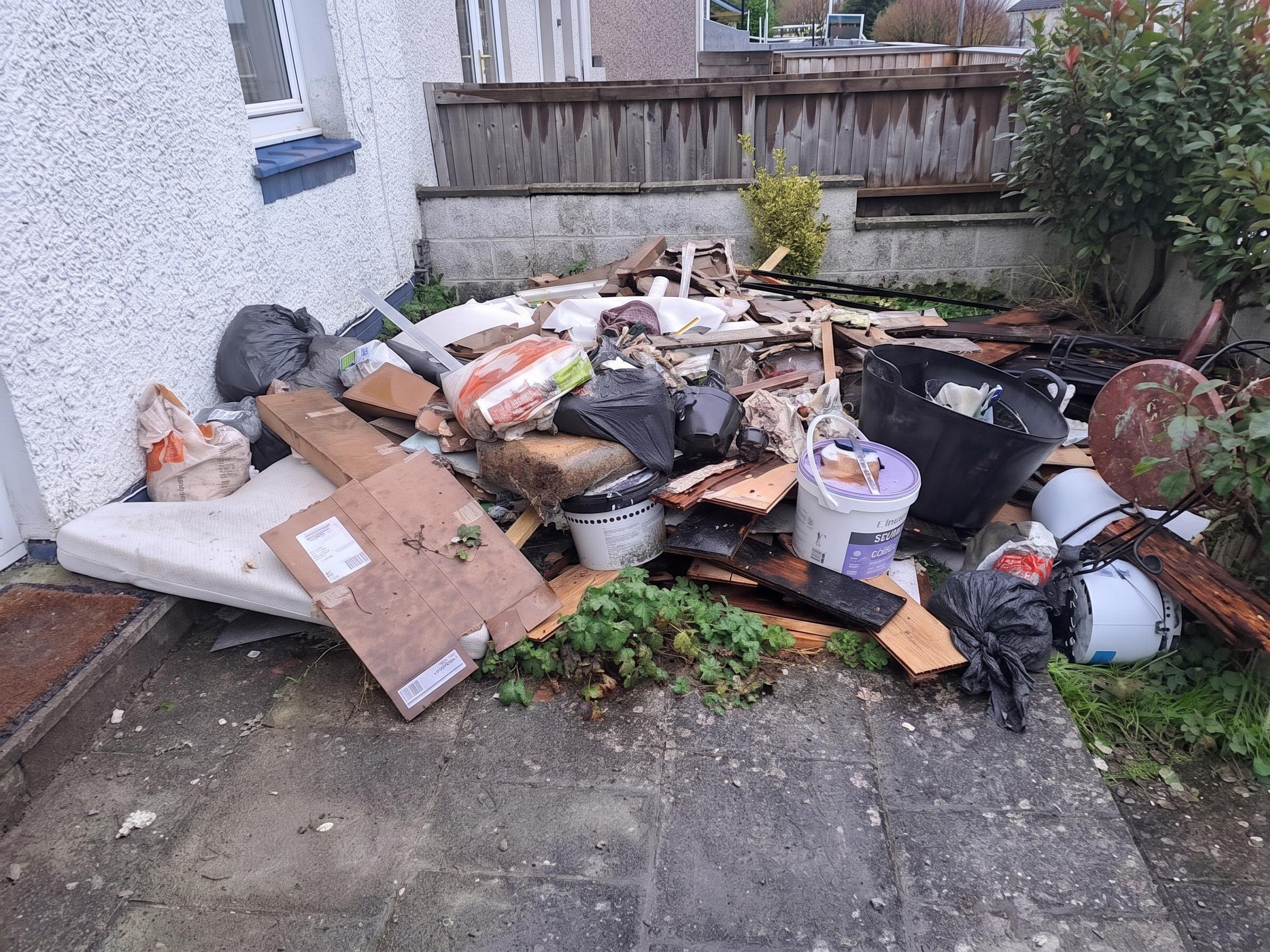Before: cluttered property awaiting clearance